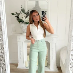 JEAN VERT PASTEL CLOUTÉ