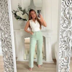 JEAN VERT PASTEL CLOUTÉ