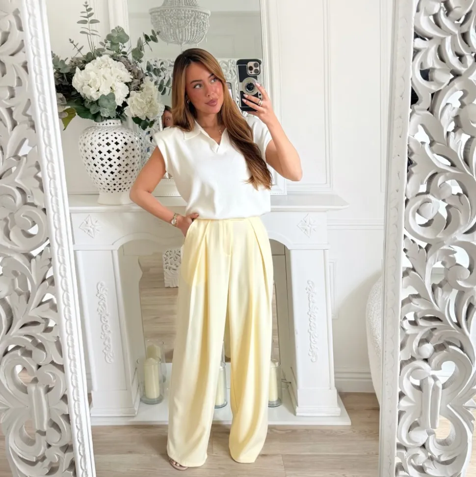 POLO SANS MANCHE EPAULETTES BLANC